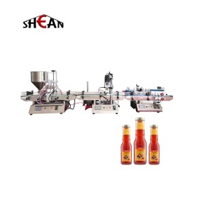 Desktop liquid bottle filling capping and labeling machine